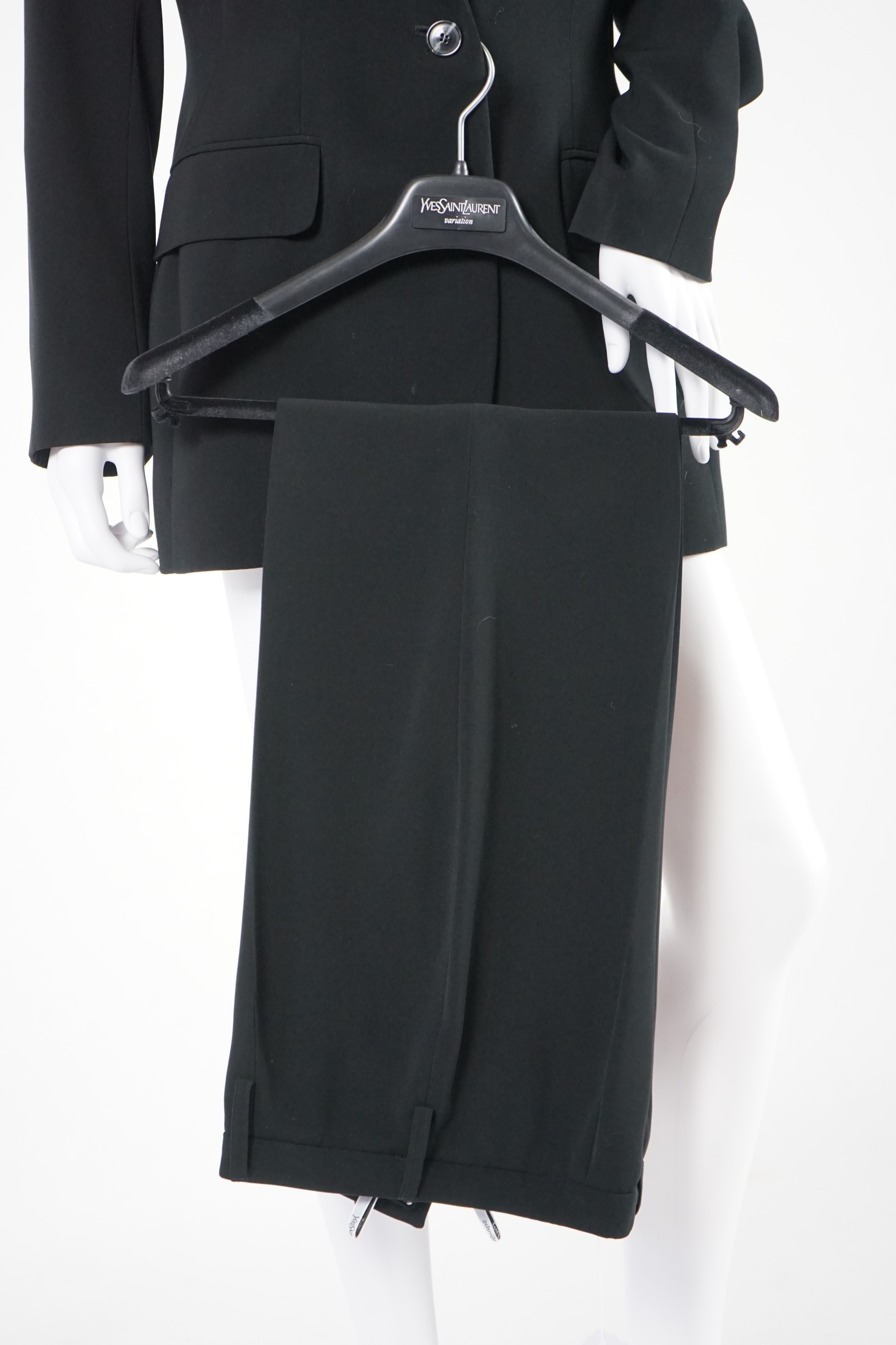 Two vintage Yves Saint Laurent variation lady's trouser suits, F 42 (UK 14). Please note alterations to make the waist smaller may have been carried out on some of the skirts. Proceeds to Happy Paws Puppy Rescue.